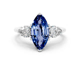 White gold Three-Stone Marquise Cut Blue Sapphire Ring with Pear Side Stones and Four-Prong Setting