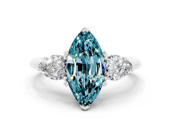 Platinum Three-Stone Marquise Cut Blue Topaz Ring with Pear Side Stones and Four-Prong Setting