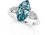 White gold Three-Stone Marquise Cut Blue Topaz Ring with Pear Side Stones and Four-Prong Setting_1