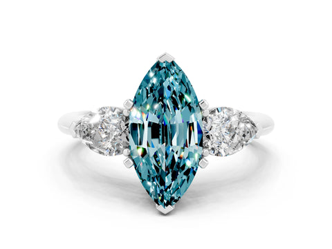 White gold Three-Stone Marquise Cut Blue Topaz Ring with Pear Side Stones and Four-Prong Setting