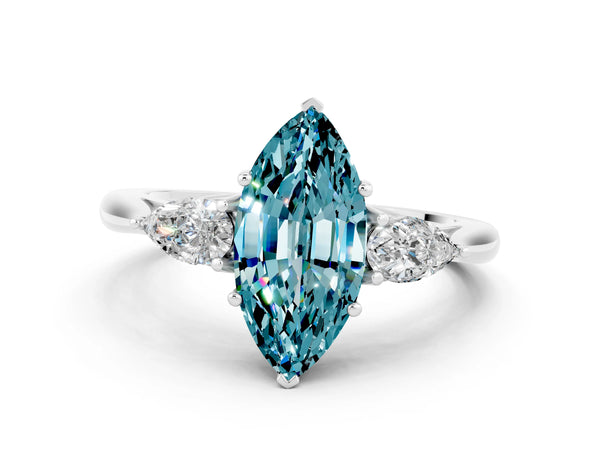Platinum Three-Stone Marquise Cut Blue Topaz Ring with Pear  Side Stones in Four-Prong Setting