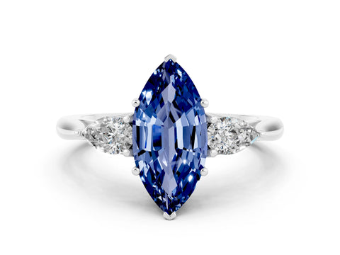 White gold Three-Stone Marquise Cut Cut Diamond Ring with Pear Side Stones in Four-Prong Setting
