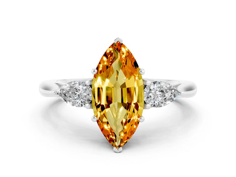 White gold Three-Stone Marquise Cut Cut Diamond Ring with Pear Side Stones in Four-Prong Setting