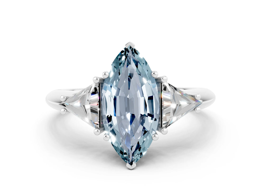 White gold Three-Stone Marquise Cut Cut Diamond Ring with Trillion Side Stones and Four-Prong Setting