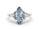 White gold Three-Stone Marquise Cut Cut Diamond Ring with Trillion Side Stones and Four-Prong Setting