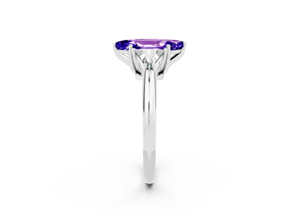 White gold Three-Stone Marquise Cut Tanzanite Engagement Ring with Trillion Side Stones and Prong Setting