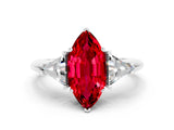 White gold Three-Stone Marquise Cut Cut Diamond Ring with Trillion Side Stones and Four-Prong Setting