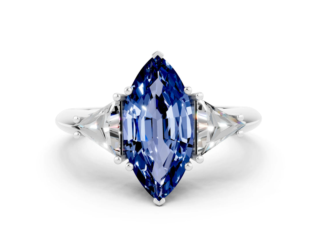 White gold Three-Stone Marquise Cut Cut Diamond Ring with Trillion Side Stones and Four-Prong Setting