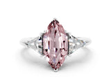White gold Three-Stone Marquise Cut Cut Diamond Ring with Trillion Side Stones and Four-Prong Setting
