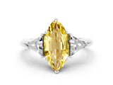 White gold Three-Stone Marquise Cut Cut Diamond Ring with Trillion Side Stones and Four-Prong Setting