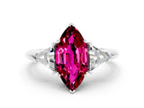 White gold Three-Stone Marquise Cut Cut Diamond Ring with Trillion Side Stones and Four-Prong Setting