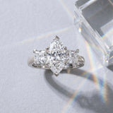 White gold Three-Stone Marquise Cut Diamond Ring with Channel Set Band and Four-Prong Setting_9