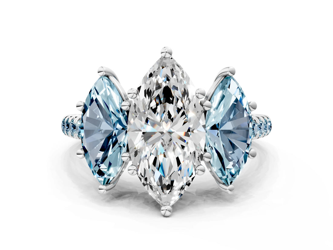 White gold Three-Stone Marquise Cut Diamond Ring with Round with Aquamarine side stone Pavé Band and Prong Setting