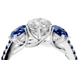 White gold Three-Stone Marquise Cut Diamond Ring with Round with Blue Sapphire side stone Pavé Band and Prong Setting_4