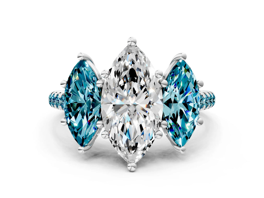 White gold Three-Stone Marquise Cut Diamond Ring with Round with Blue Topaz side stone Pavé Band and Prong Setting