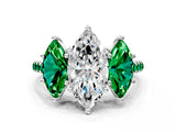 White gold Three-Stone Marquise Cut Diamond Ring with Round with Emerald side stone Pavé Band and Prong Setting