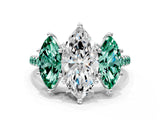 White gold Three-Stone Marquise Cut Diamond Ring with Round with Green Sapphire side stone Pavé Band and Prong Setting