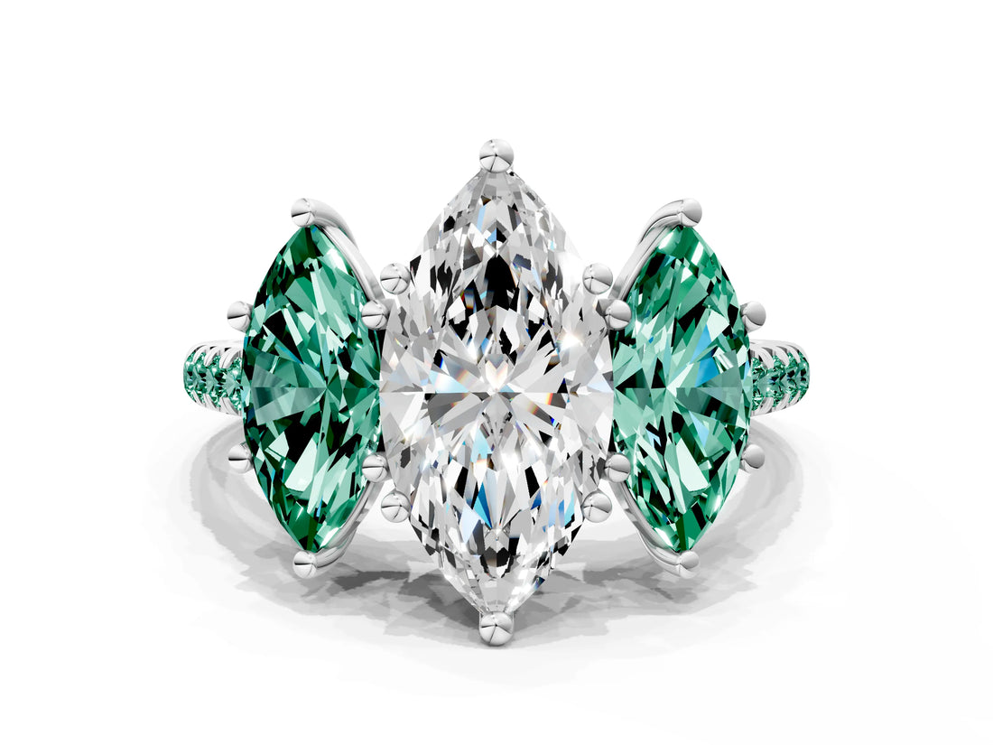 White gold Three-Stone Marquise Cut Diamond Ring with Round with Green Sapphire side stone Pavé Band and Prong Setting