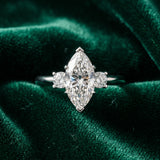 White gold Three-Stone Marquise Cut Diamond Solitaire with Prong Setting and Classic Band_16