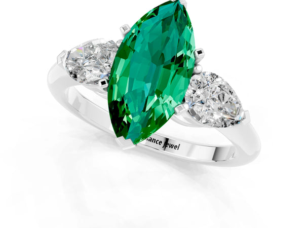 Platinum Three-Stone Marquise Cut Emerald Ring with Pear Side Stones and Four-Prong Setting