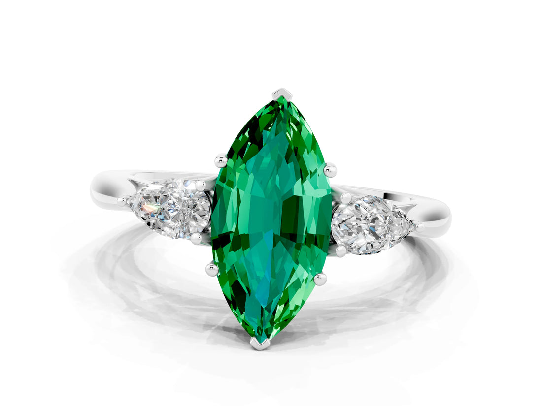 White gold Three-Stone Marquise Cut Emerald Ring with Pear  Side Stones in Four-Prong Setting_12