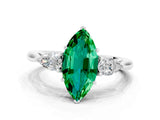 White gold Three-Stone Marquise Cut Emerald Ring with Pear  Side Stones in Four-Prong Setting_12
