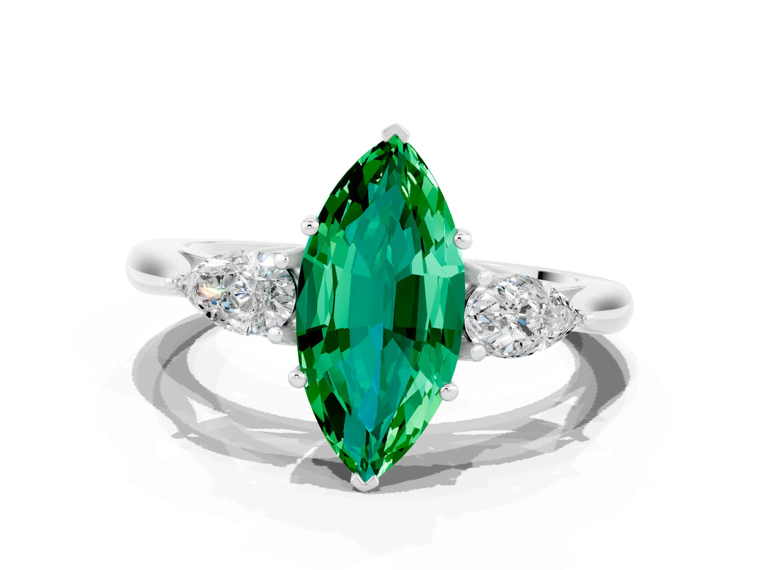 White gold Three-Stone Marquise Cut Emerald Ring with Pear  Side Stones in Four-Prong Setting_48