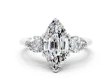 White gold Three-Stone Marquise Cut Moissanite Ring with Pear Side Stones and Four-Prong Setting