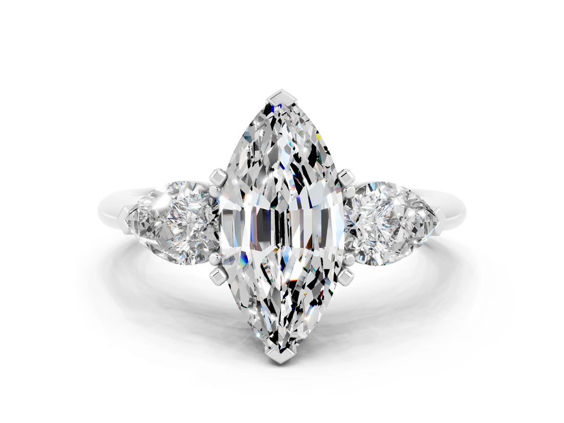 White gold Three-Stone Marquise Cut Moissanite Ring with Pear Side Stones and Four-Prong Setting