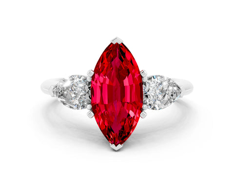 White gold Three-Stone Marquise Cut Ruby Ring with Pear Side Stones and Four-Prong Setting