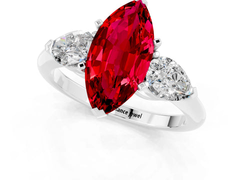 White gold Three-Stone Marquise Cut Ruby Ring with Pear Side Stones and Four-Prong Setting_1