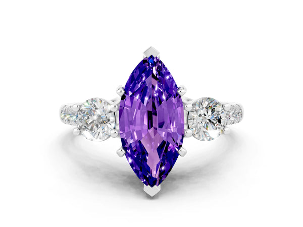 Platinum Three-Stone Marquise Cut Tanzanite Pavé Band with Four-Prong Setting