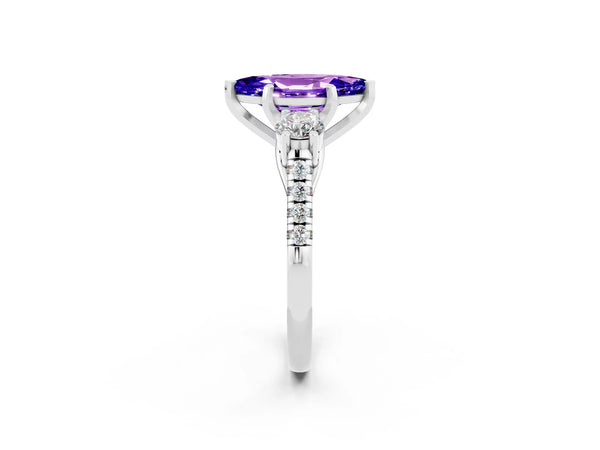 Platinum Three-Stone Marquise Cut Tanzanite Pavé Band with Four-Prong Setting