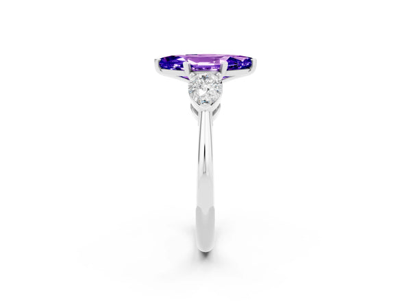 Platinum Three-Stone Marquise Cut Tanzanite Ring with Pear Side Stones and Four-Prong Setting