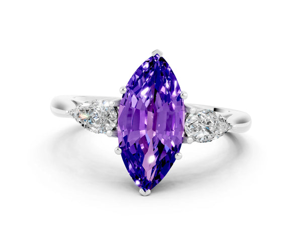 Platinum Three-Stone Marquise Cut Tanzanite Ring with Pear  Side Stones in Four-Prong Setting