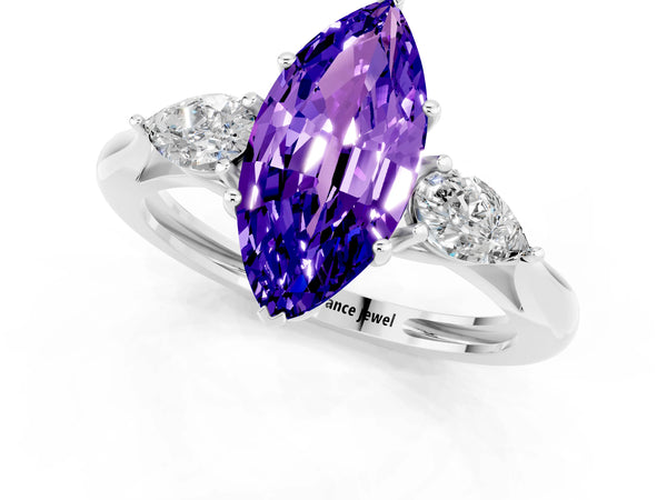 White gold Three-Stone Marquise Cut Tanzanite Ring with Pear  Side Stones in Four-Prong Setting
