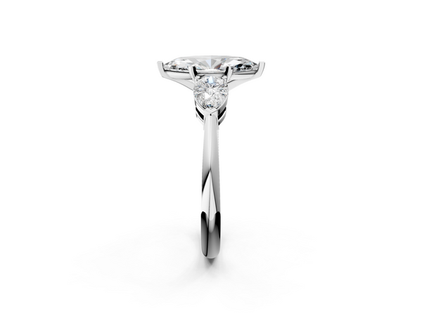 White gold Three-Stone Marquise Cut Diamond Ring with Pear Side Stones and Four-Prong Setting