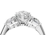 White gold Three-Stone Marquise Diamond Ring with Pear Side Stones in Four-Prong Setting_130