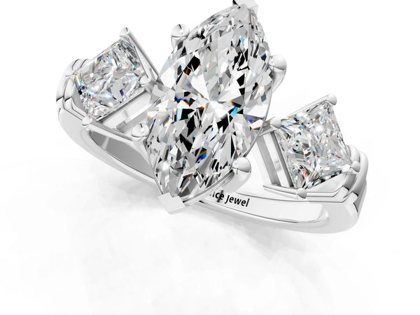 White gold Three-Stone Marquise and Princess Cut Diamond Ring with Channel Band and Four-Prong Setting
