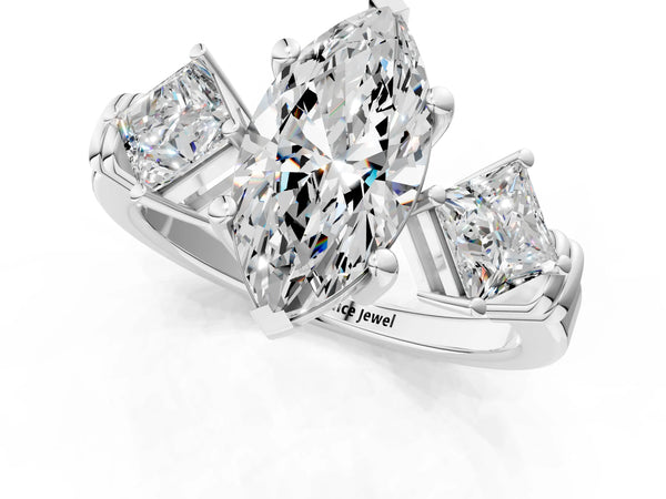 White gold Three-Stone Marquise and Princess Cut Diamond Ring with Channel Band and Four-Prong Setting