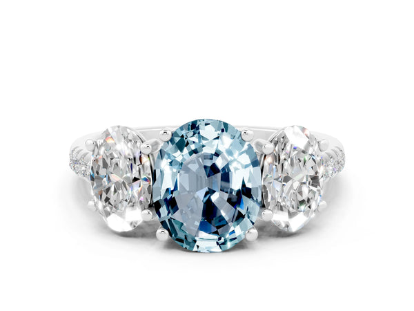 Platinum Three-Stone Oval Cut Aquamarine Ring with Round  Pavé Band and Prong Setting