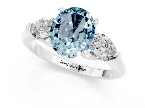 White gold Three-Stone Oval Cut Aquamarine Ring with Pear Side Stones and Four-Prong Setting_1