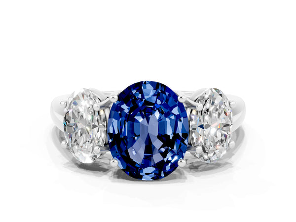 Platinum Three-Stone Oval Cut Blue Sapphire Engagement Ring with Prong Setting