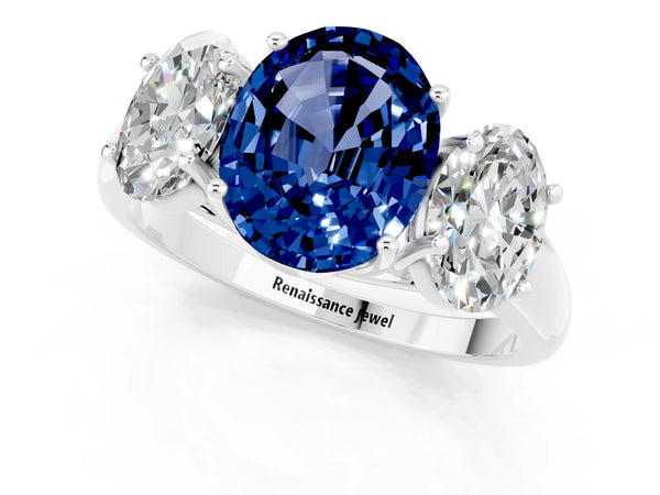 Silver Three-Stone Oval Cut Blue Sapphire Engagement Ring with Prong Setting