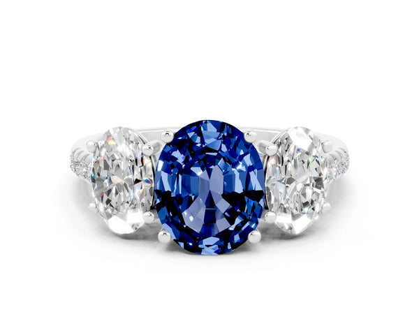 18K White Gold Three-Stone Blue Sapphire Ring with Round Pavé Band and Prong Setting