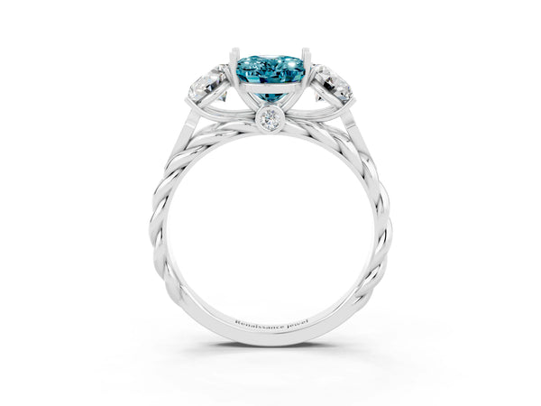 Platinum Three-Stone Oval Cut Blue Topaz Braided Band Ring with Four-Prong Setting