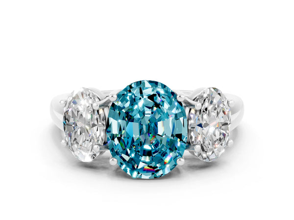 Platinum Three-Stone Oval Cut Blue Topaz Engagement Ring with Prong Setting