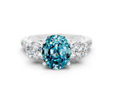 White gold Three-Stone Oval Cut Blue Topaz Pavé Band with Four-Prong Setting