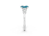 White gold Three-Stone Oval Cut Blue Topaz Ring with Pear Side Stones and Four-Prong Setting_2