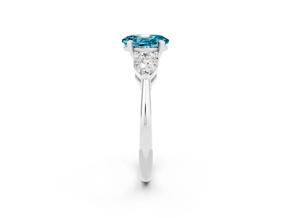 White gold Three-Stone Oval Cut Blue Topaz Ring with Pear Side Stones and Four-Prong Setting